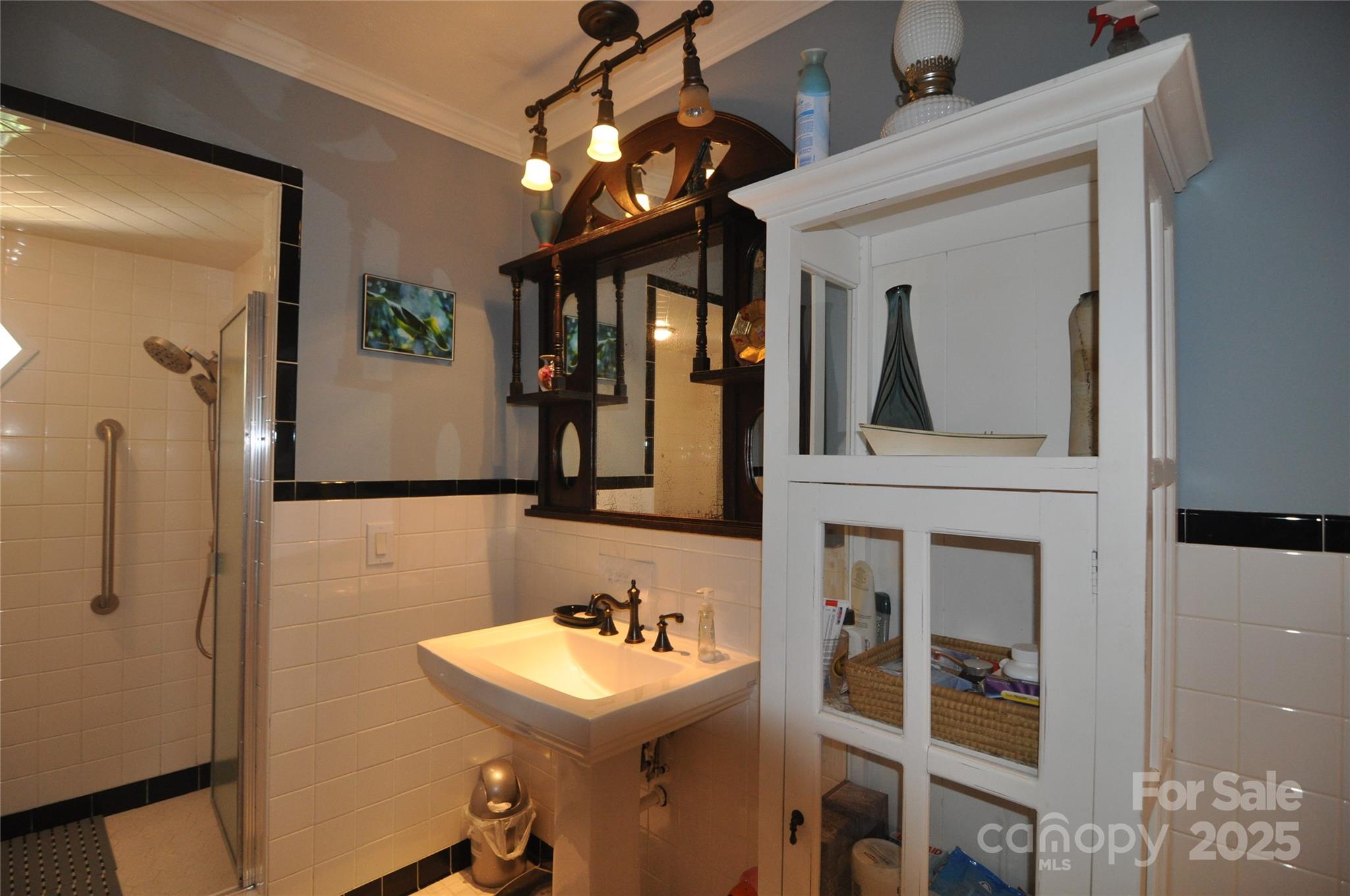 502 Meadowlark Drive Tryon, NC 28782 - Photo 29 of 40 a bathroom with a sink and a mirror