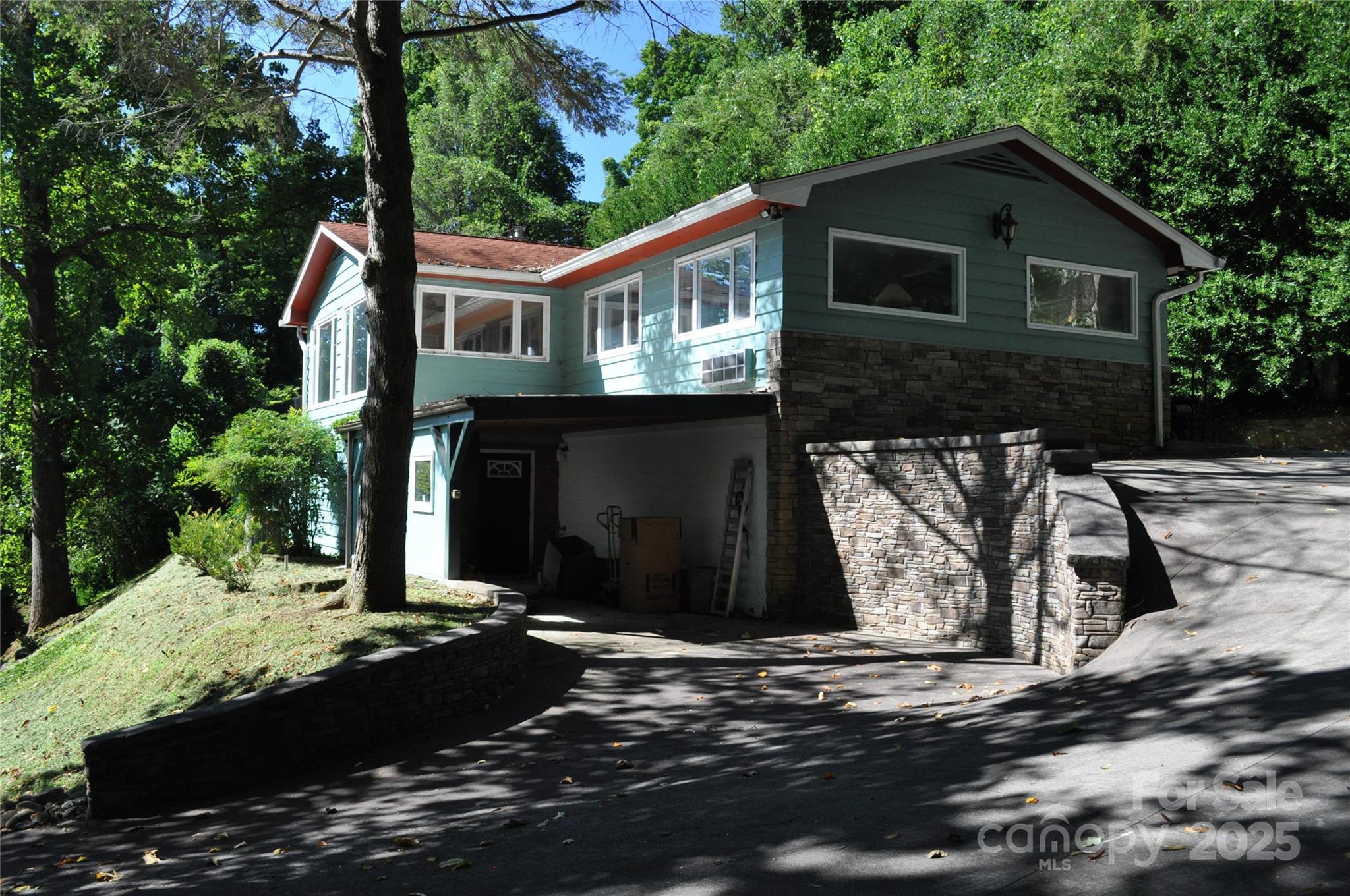 502 Meadowlark Drive Tryon, NC 28782 - Photo 3 of 40 a front view of a house with a yard