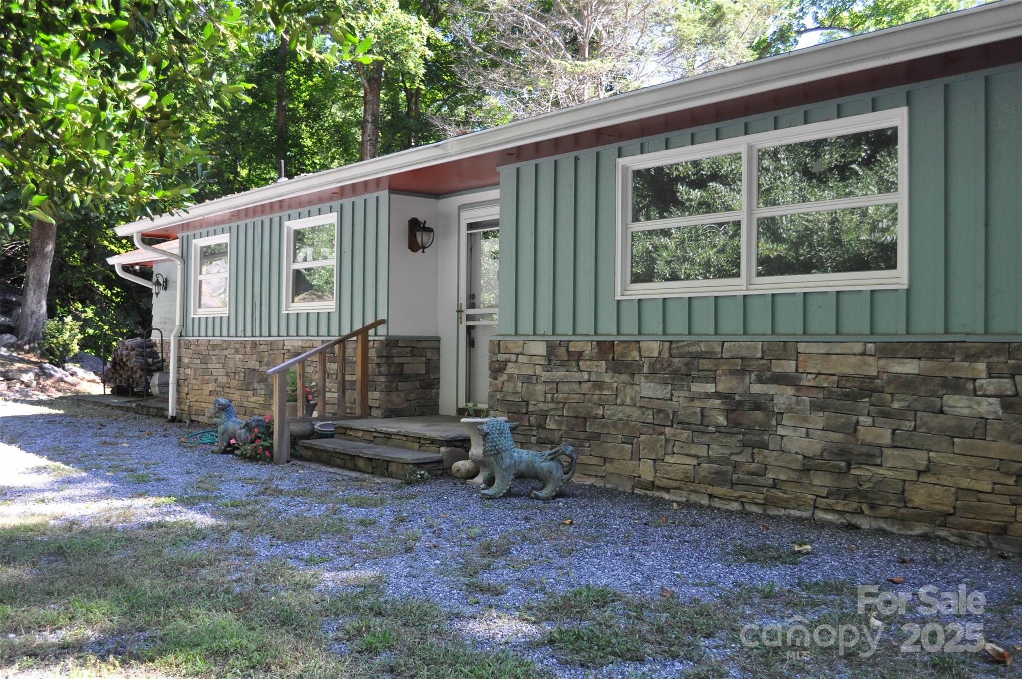 502 Meadowlark Drive Tryon, NC 28782 - Photo 4 of 40 a view of a small house with a yard