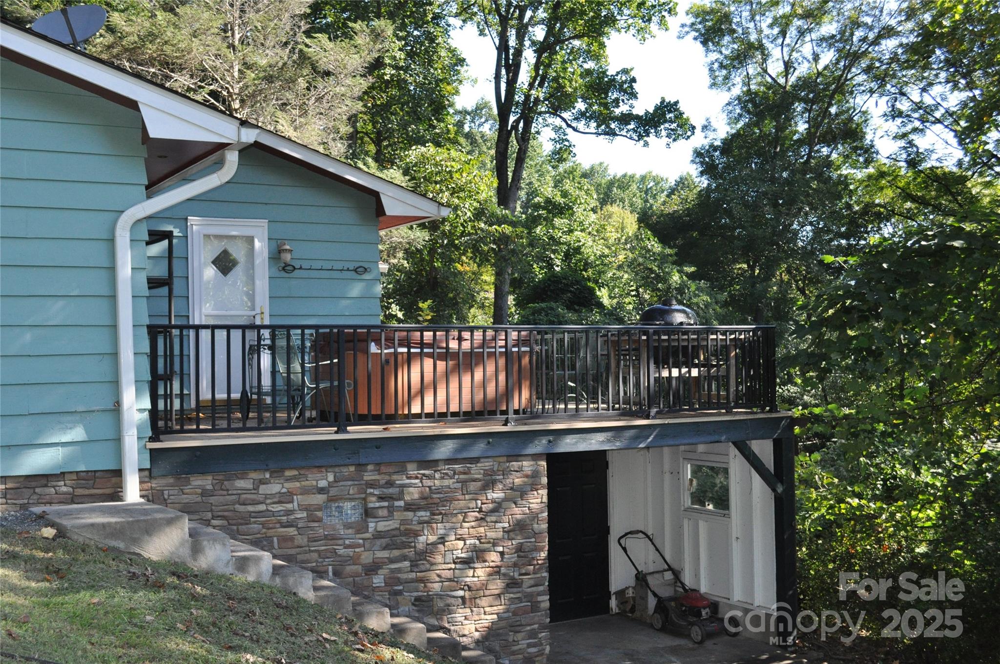 502 Meadowlark Drive Tryon, NC 28782 - Photo 9 of 40 a view of a small deck with wooden fence and floor