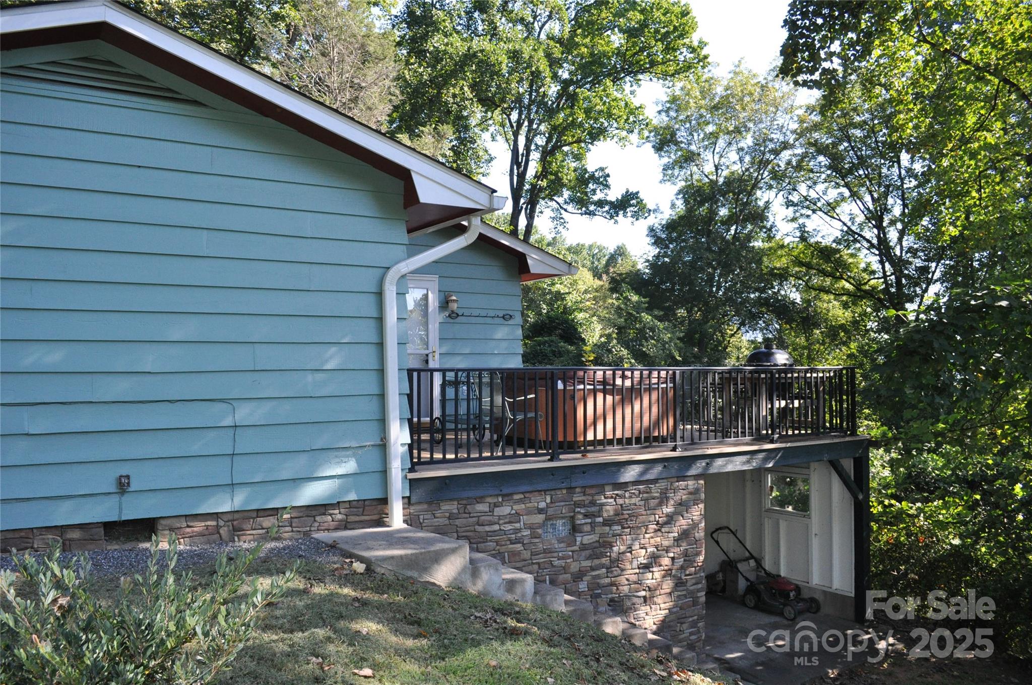 502 Meadowlark Drive Tryon, NC 28782 - Photo 10 of 40 a view of a small yard and wooden fence