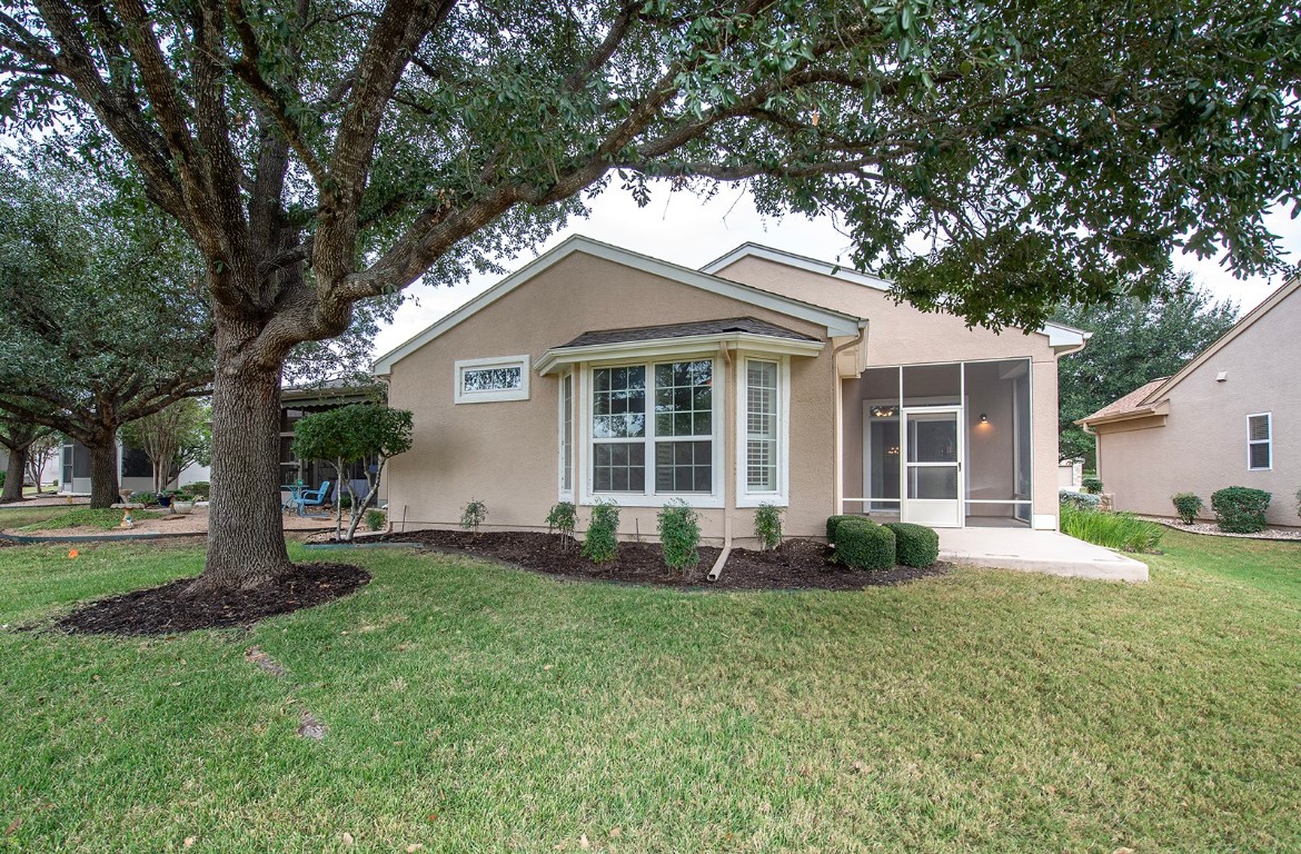 510 Crockett Loop Georgetown, TX 78633 - Photo 1 of 16 a front view of a house with a yard and garage
