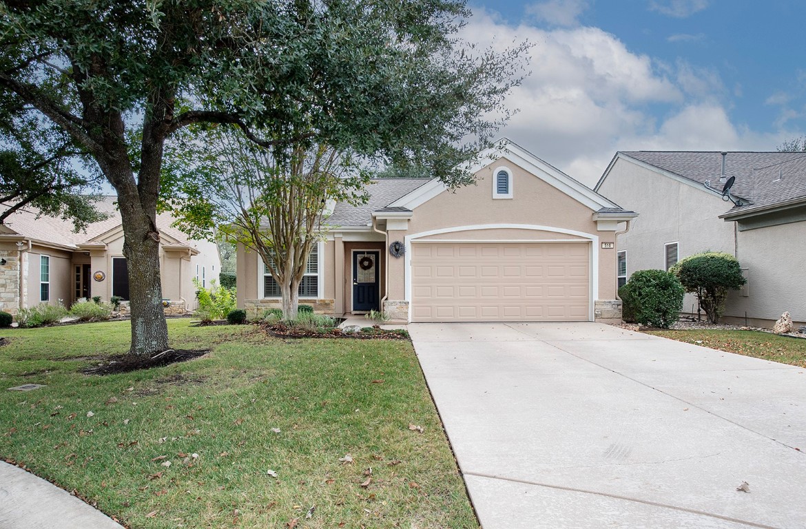 510 Crockett Loop Georgetown, TX 78633 - Photo 3 of 16 a front view of a house with a yard