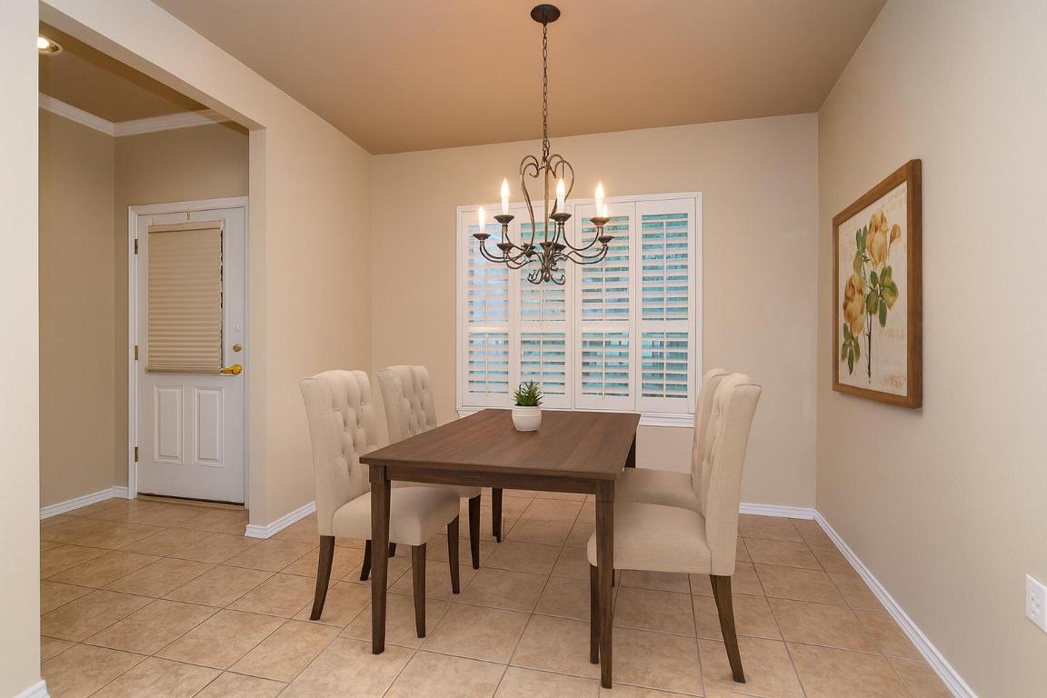 510 Crockett Loop Georgetown, TX 78633 - Photo 4 of 16 a view of a dining room with furniture and window