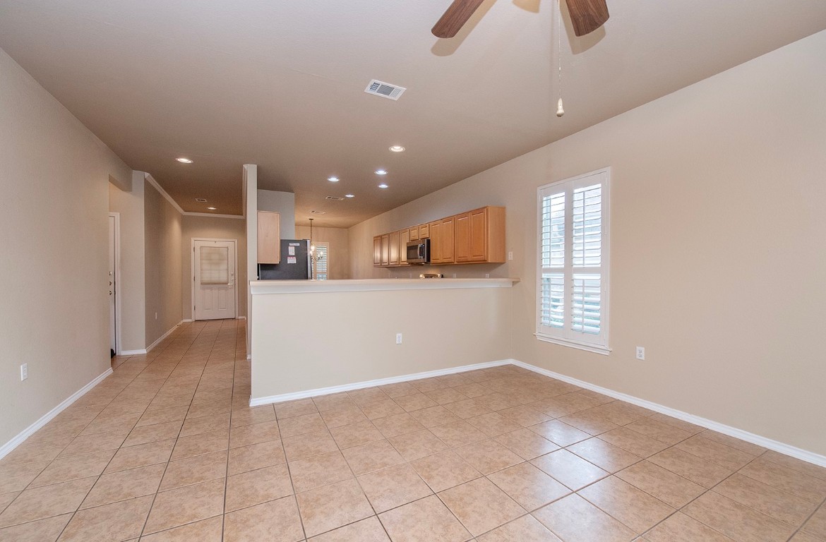 510 Crockett Loop Georgetown, TX 78633 - Photo 7 of 16 a view of kitchen and window