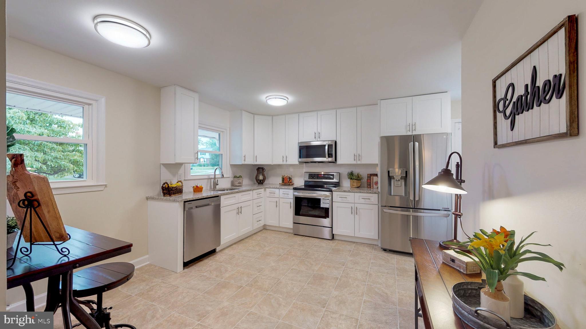 4722 Vicky Road Baltimore, MD 21236 - Photo 11 of 32 New white cabinets, stainless steel appliances