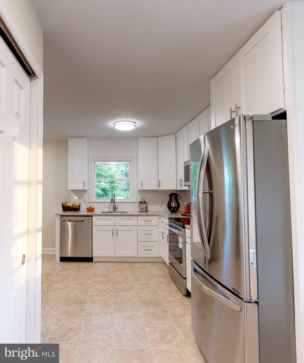 4722 Vicky Road Baltimore, MD 21236 - Photo 9 of 32 Entrance to kitchen from dining room