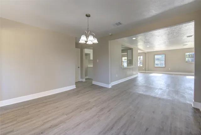 a view of a livingroom with wooden floor