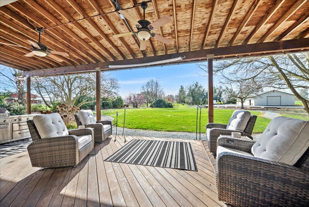 9777 Tavernor Road Wilton, CA 95693 - Photo 33 of 59 a view of a patio with couches table and chairs