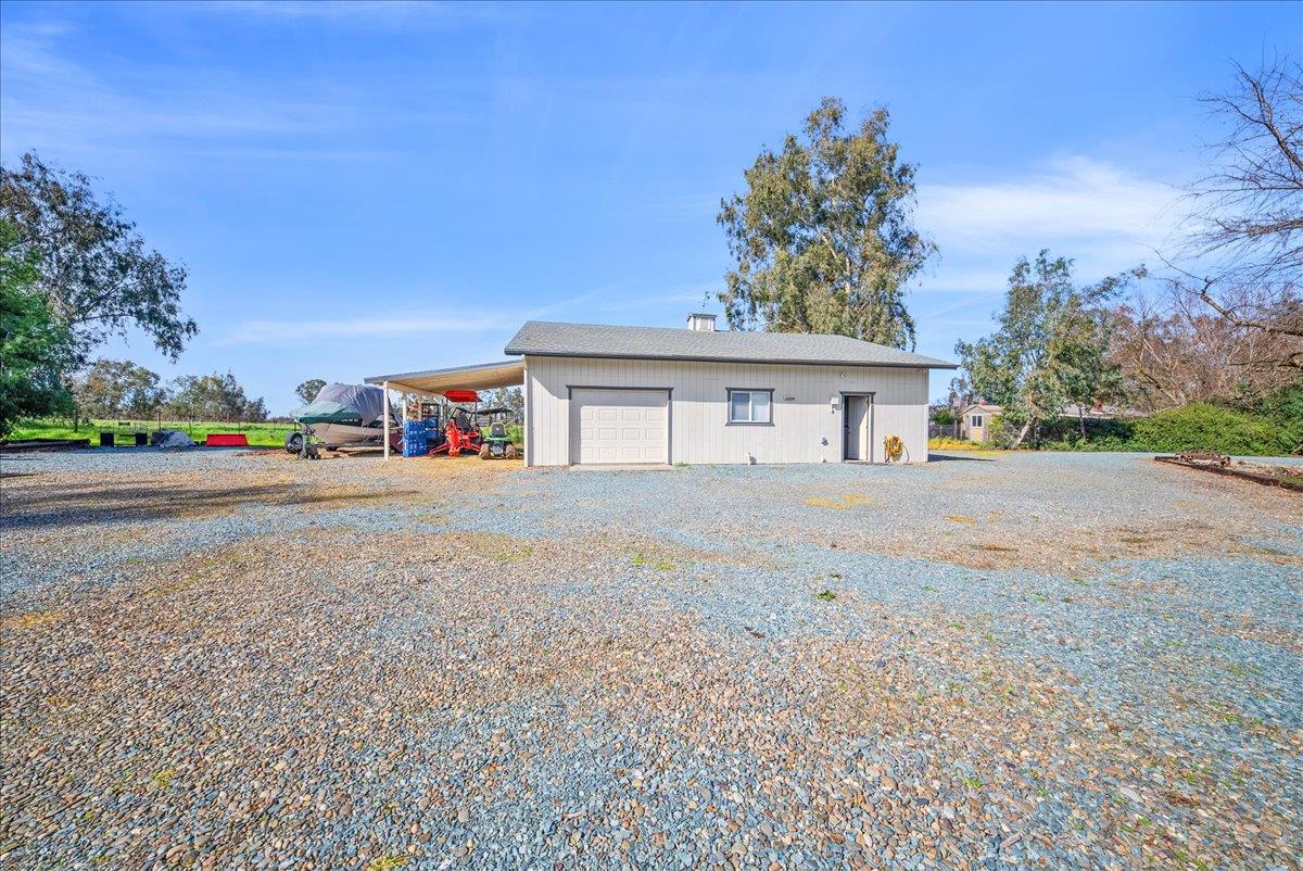 9777 Tavernor Road Wilton, CA 95693 - Photo 43 of 59 a view of house with outdoor space and street view