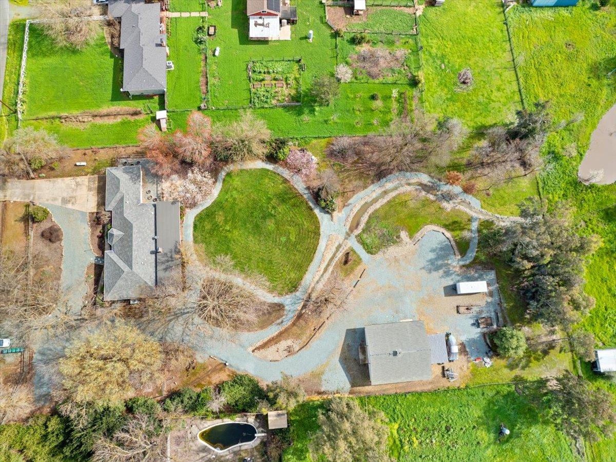9777 Tavernor Road Wilton, CA 95693 - Photo 57 of 59 an aerial view of a house with outdoor space tennis court