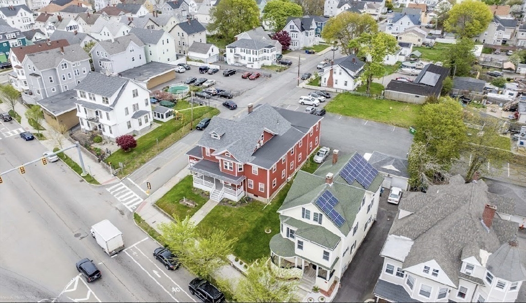 31 Niagara Street Fall River, MA 02721 - Photo 16 of 19 an aerial view of a house with a yard and outdoor seating