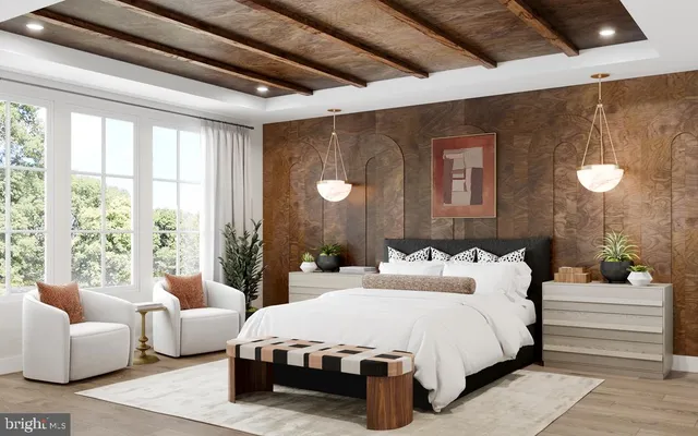 a bedroom with furniture and large windows