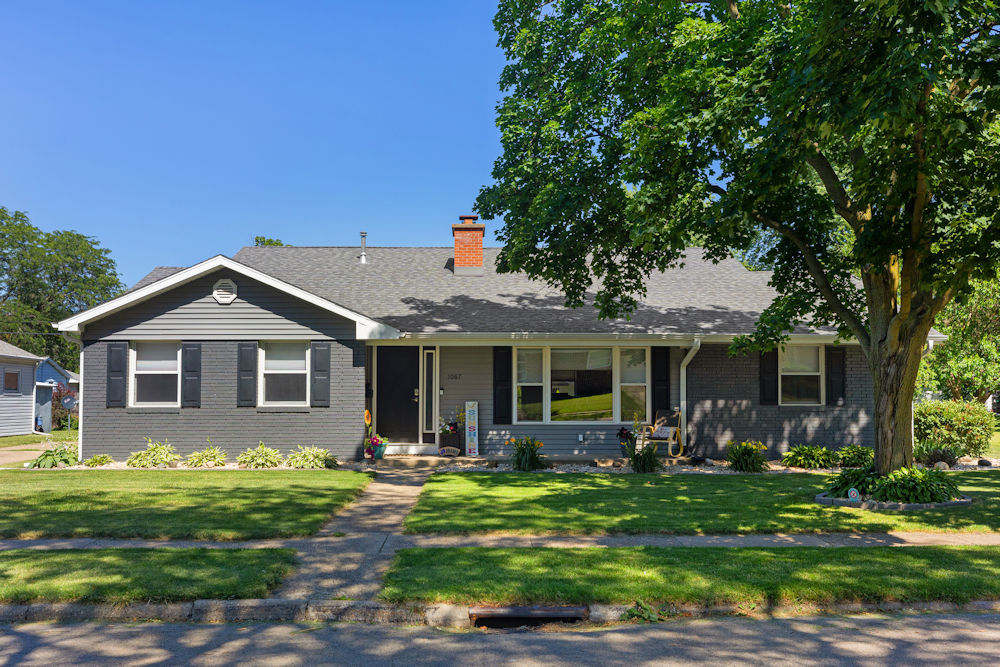 1067 North Main Street Rochelle, IL 61068 - Photo 1 of 18 a front view of house with yard and green space