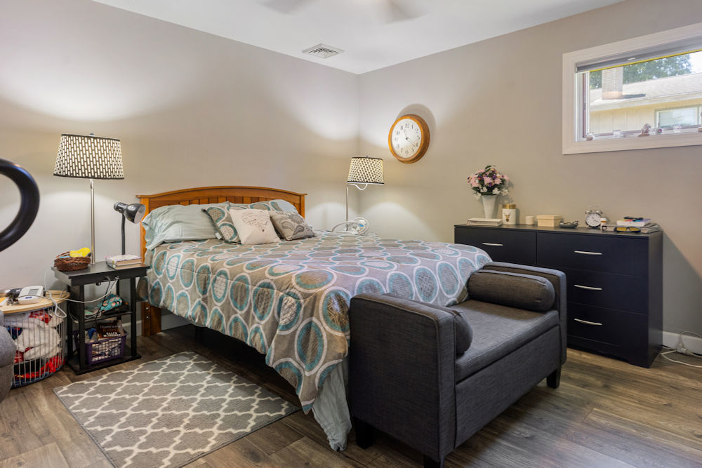 1067 North Main Street Rochelle, IL 61068 - Photo 12 of 18 a bedroom with a bed and lamp