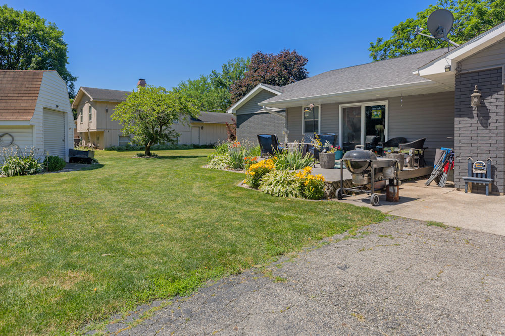 1067 North Main Street Rochelle, IL 61068 - Photo 17 of 18 a view of a house with backyard and sitting area