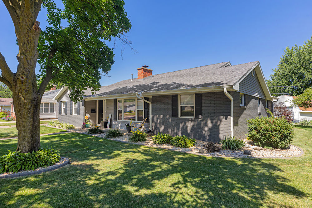 1067 North Main Street Rochelle, IL 61068 - Photo 2 of 18 a front view of a house with a yard