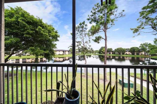 a view of a street view from a balcony