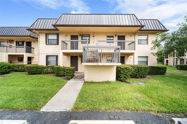 a view of a house with garden