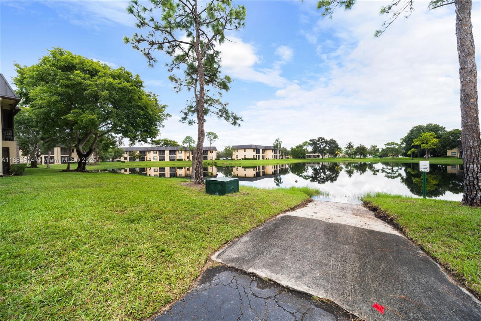 9258 Northwest 1st Street, Unit 206 Pembroke Pines, FL 33024 - Photo 21 of 22 a view of a park with houses
