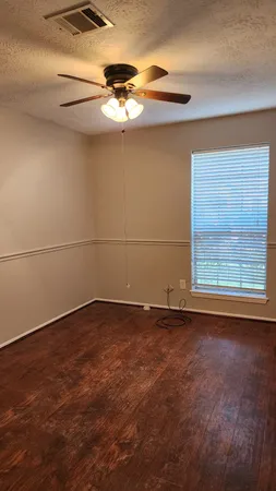 a view of a small space with a fan