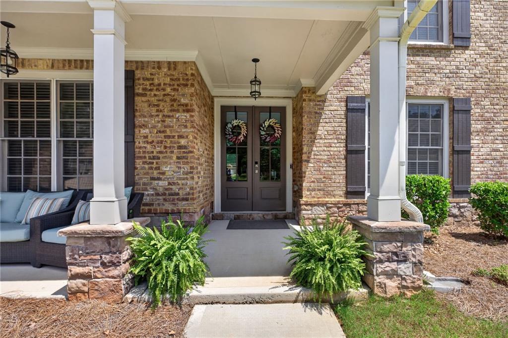139 Manchester Lane Villa Rica, GA 30180 - Photo 4 of 60 a front view of a house with potted plants