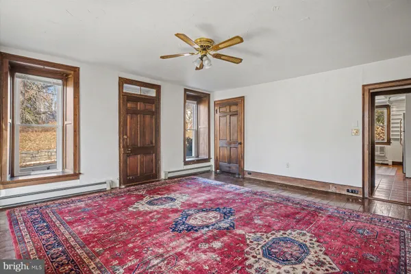 a view of a livingroom with a workspace