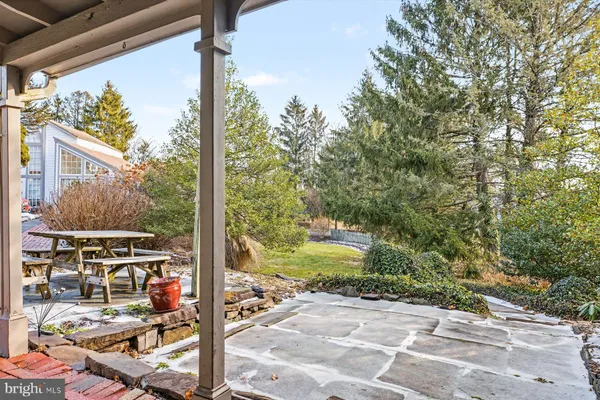 a view of a glass door and front door