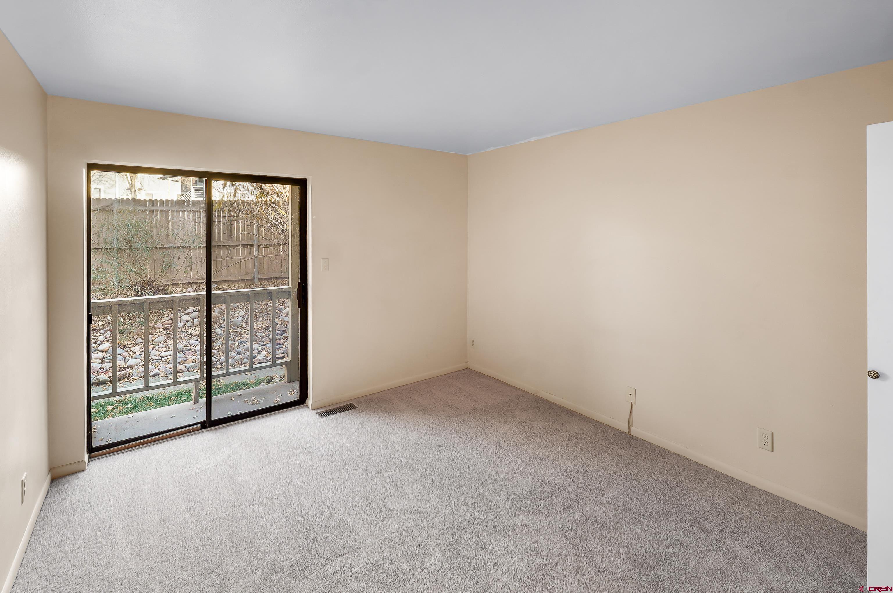1200 Florida Road, Unit 7 Durango, CO 81301 - Photo 12 of 26 an empty room with windows and closet