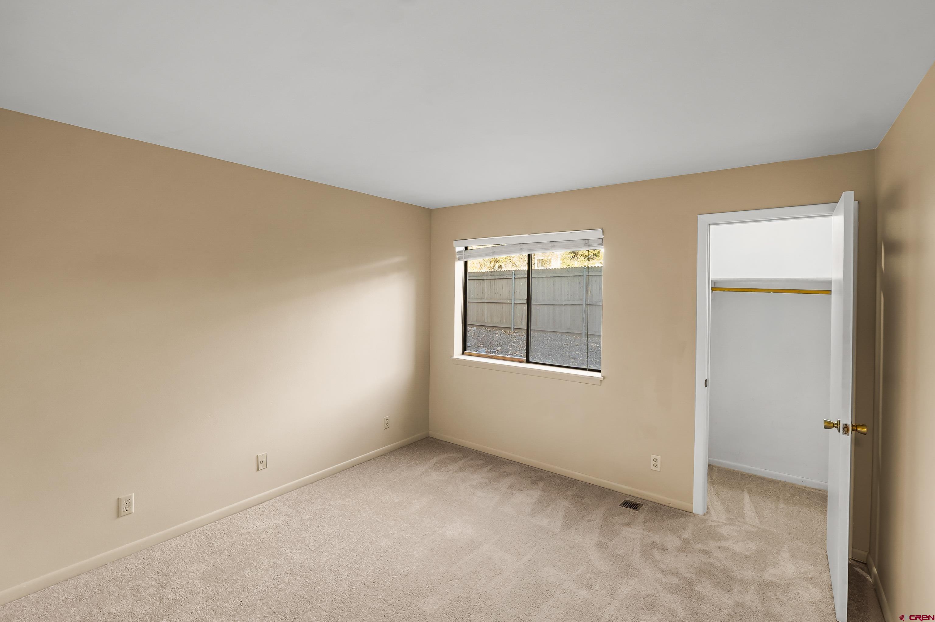 1200 Florida Road, Unit 7 Durango, CO 81301 - Photo 20 of 26 an empty room with windows