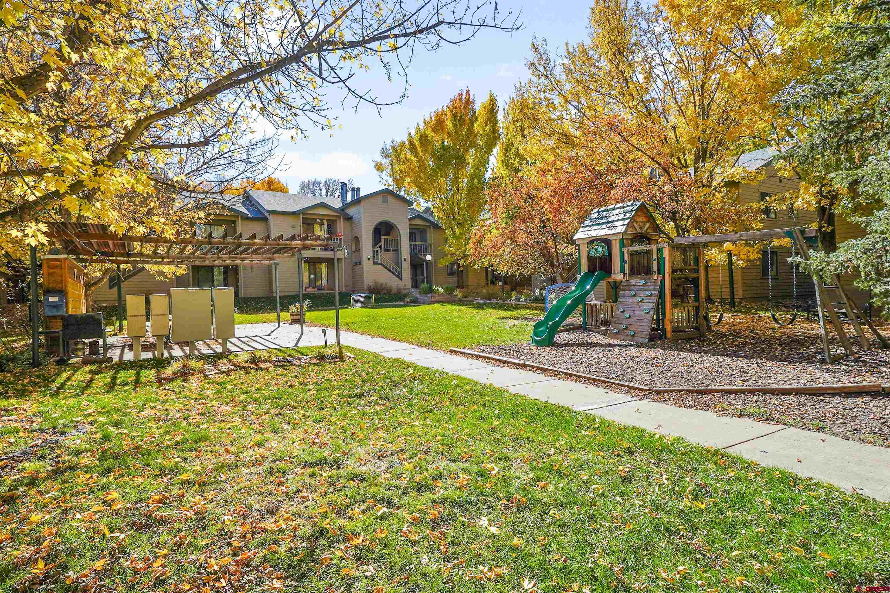 1200 Florida Road, Unit 7 Durango, CO 81301 - Photo 23 of 26 a view of a house with a yard