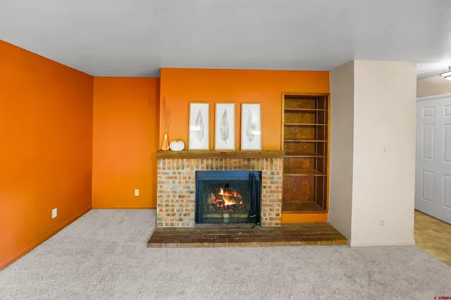 a room with fireplace and a fireplace