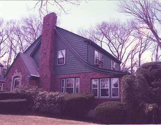 120 Garland Road Newton, MA 02459 - Photo 1 of 1 a red brick building with large windows and a large tree