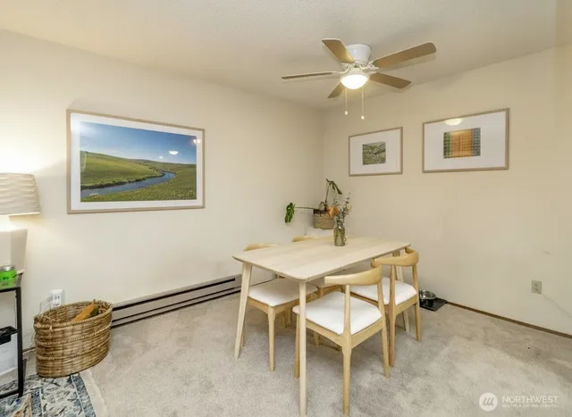 a view of a dining room with furniture