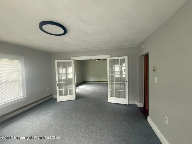 a view of a livingroom with a staircase