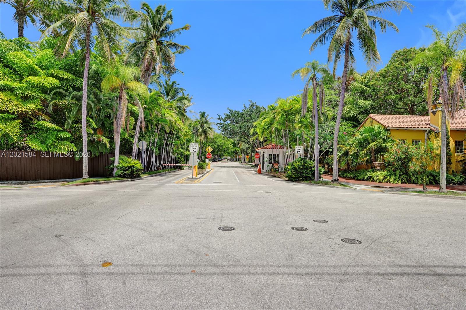 811 Northeast 73rd Street Miami, FL 33138 - Photo 39 of 51 a view of a house with a yard and palm trees