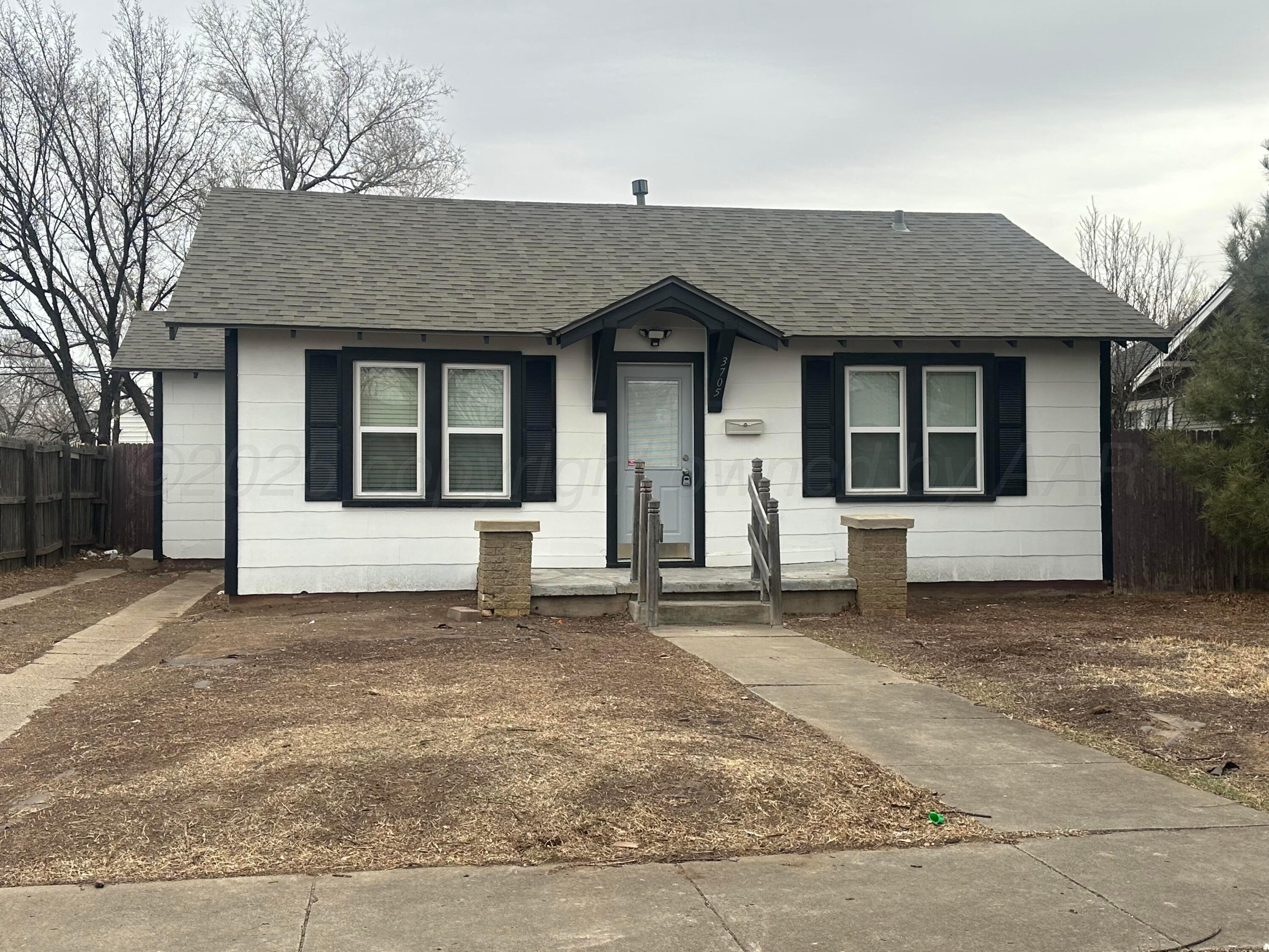 0 Portfolio Package Amarillo, TX 79110 - Photo 7 of 17 a front view of a house with a large window