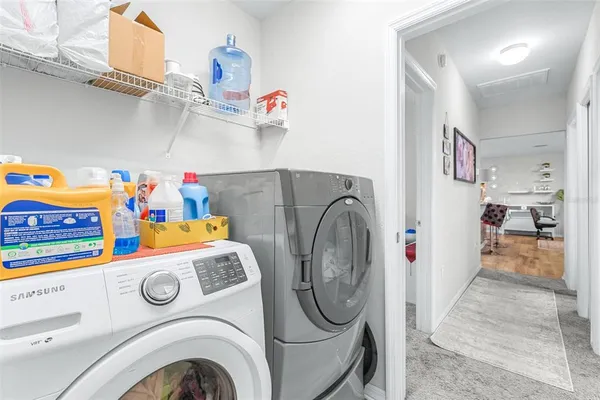 a utility room with dryer and washer