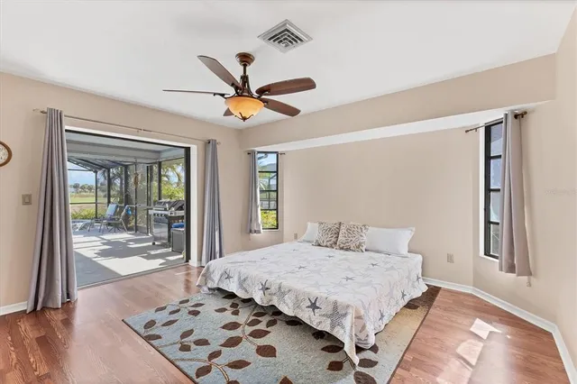 an aerial view of a house with swimming pool garden and patio