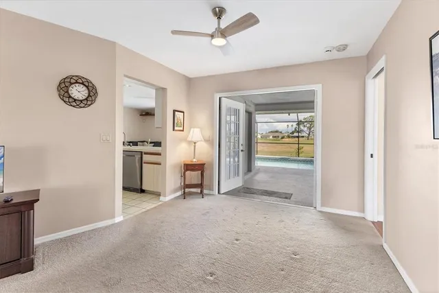 a bedroom with a bed and a view of bathroom