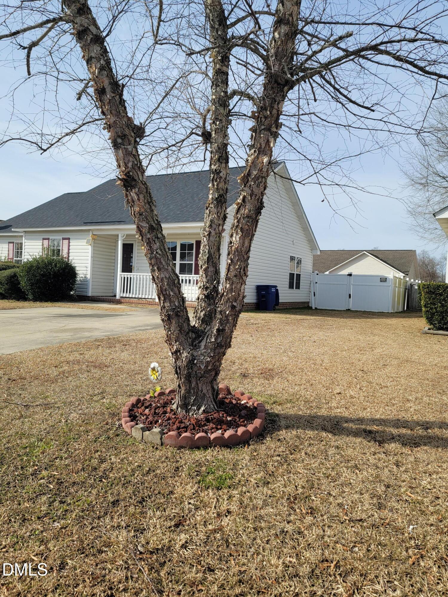 3670 Highland Drive Ayden, NC 28513 - Photo 4 of 18 a front view of a house with garden