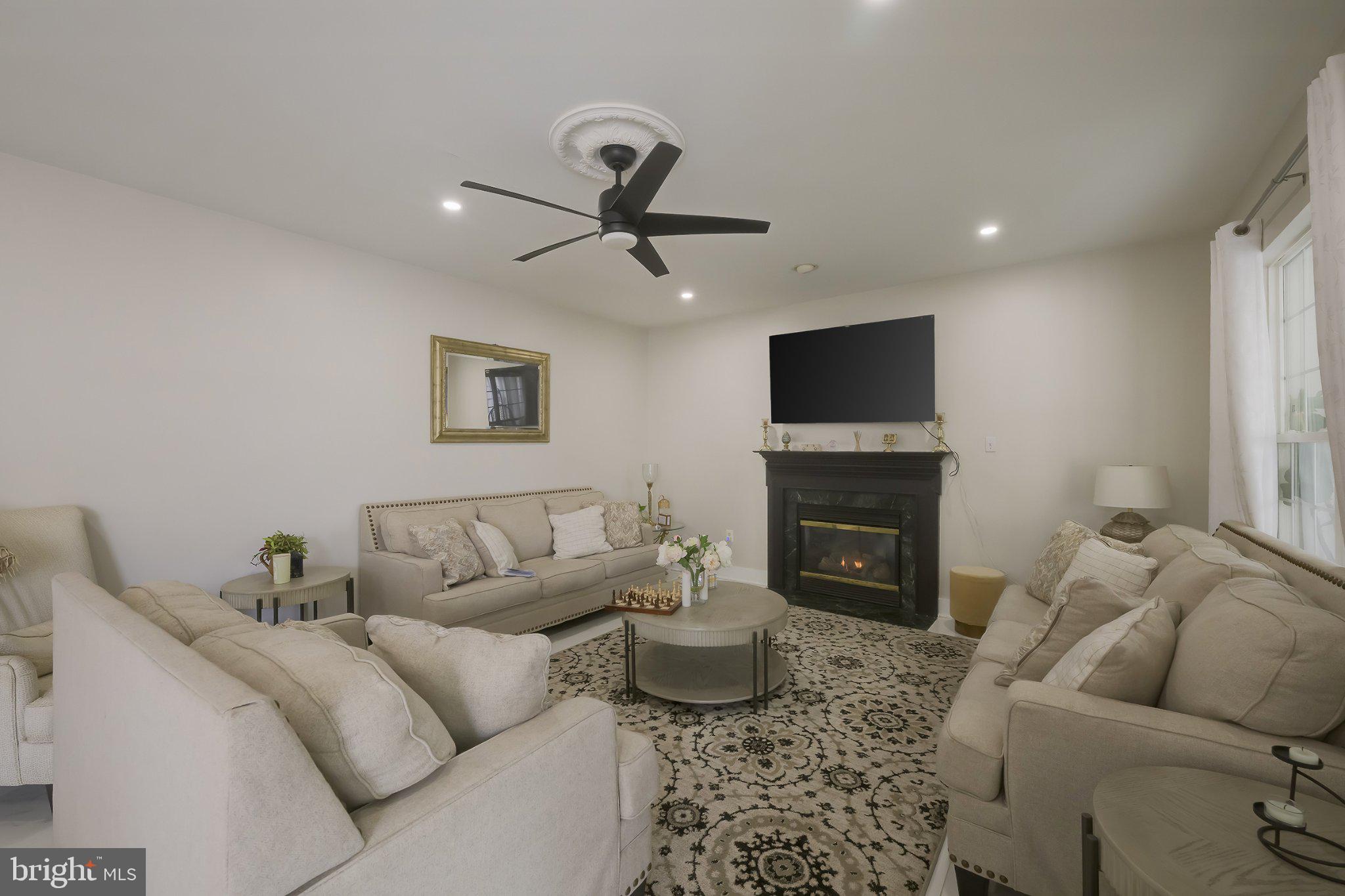 601 Crossover Court Frederick, MD 21703 - Photo 7 of 55 Cozy living room with modern charm.