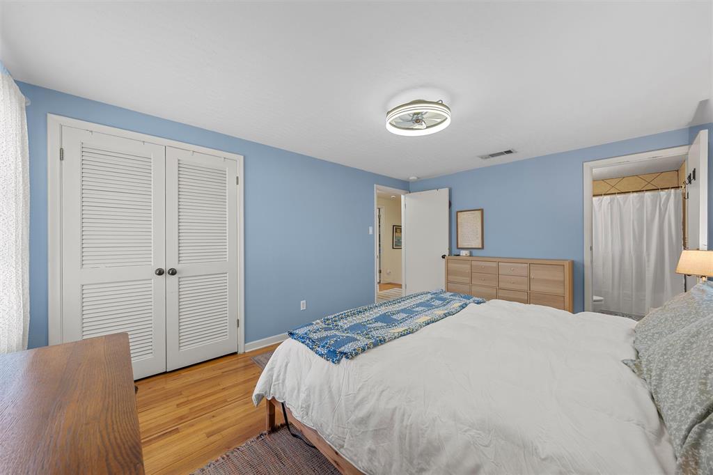 2216 Hermanson Drive Waco, TX 76710 - Photo 23 of 39 a bedroom with a bed and a dresser