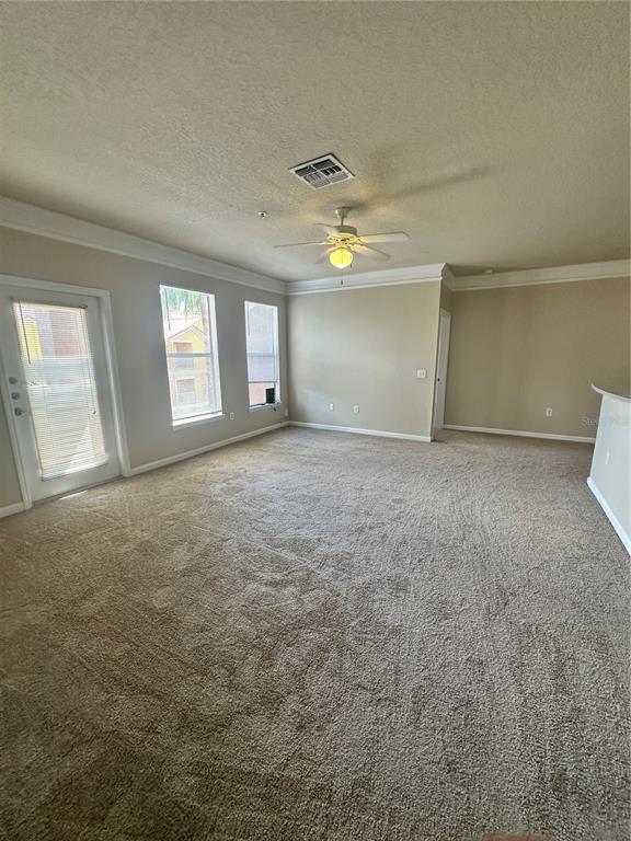 8849 Villa View Circle, Unit 306 Orlando, FL 32821 - Photo 14 of 15 a view of an empty room with a window