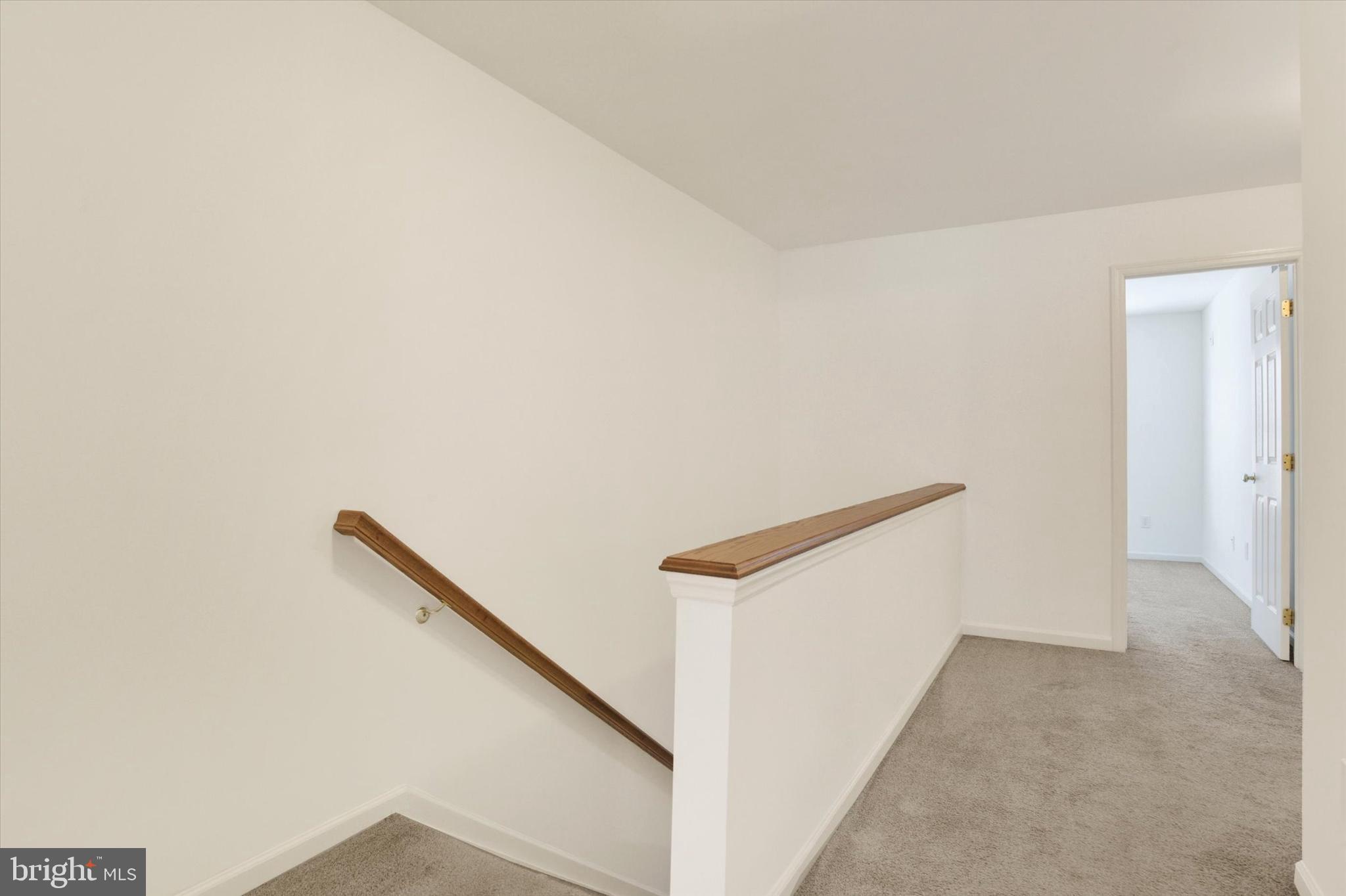 1041 Memory Lane Harrisburg, PA 17111 - Photo 18 of 31 a view of staircase with white walls