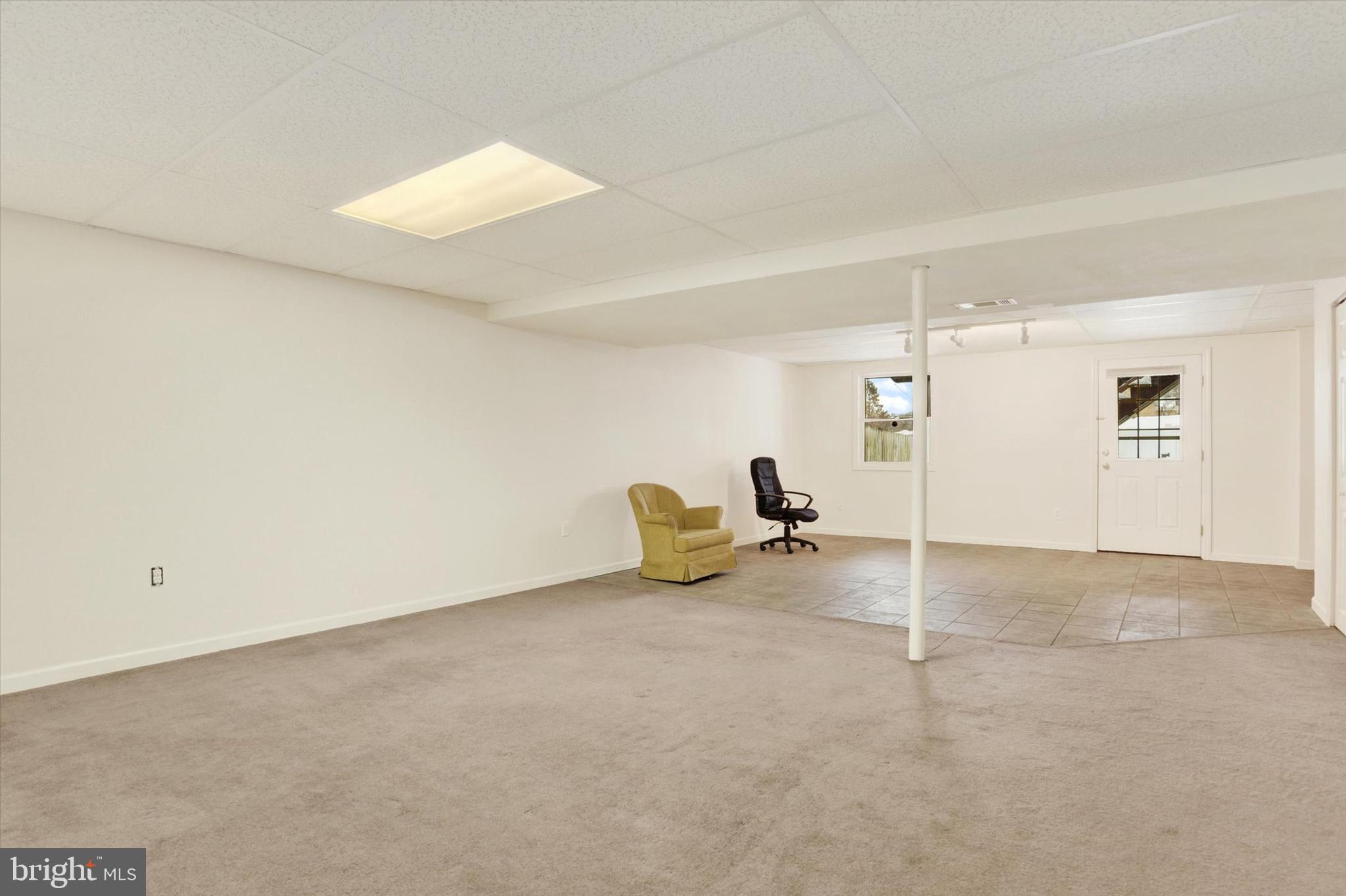 1041 Memory Lane Harrisburg, PA 17111 - Photo 25 of 31 a view of a room with furniture and a ceiling fan