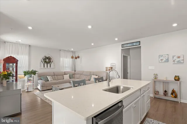 a view of a dining room with furniture and window