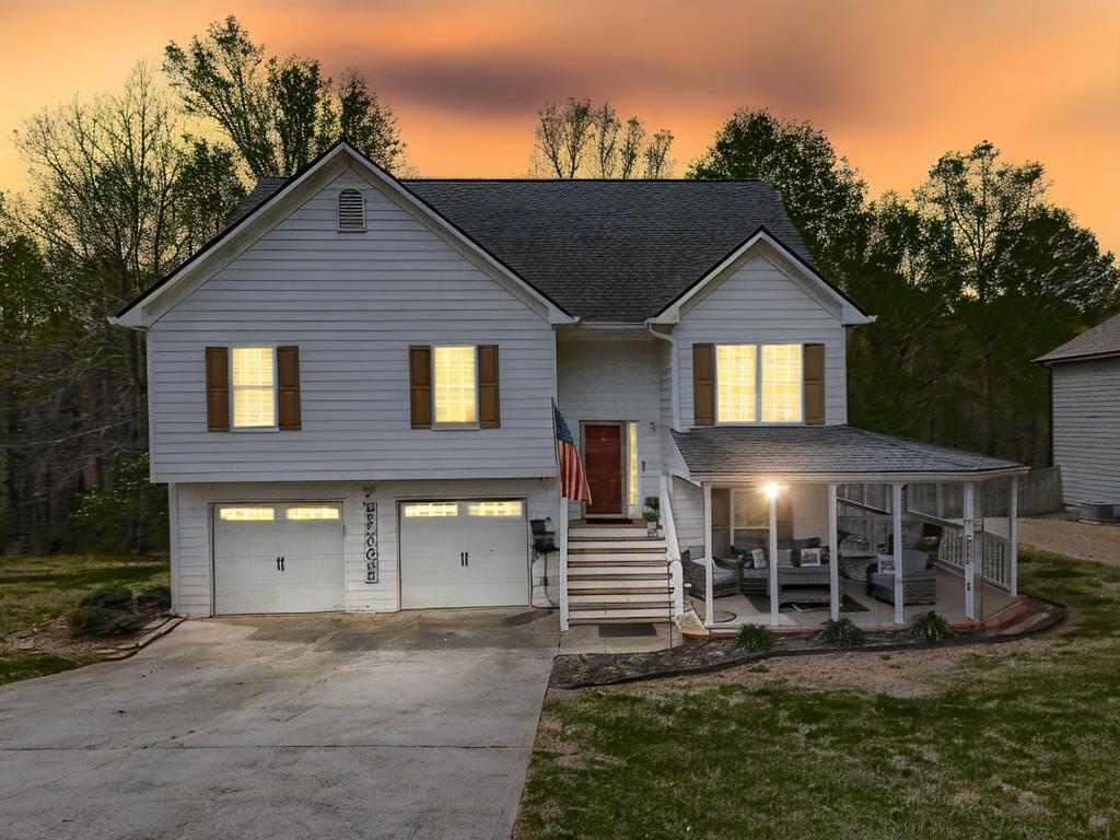 68 Arbor Hills Road South Talking Rock, GA 30175 - Photo 1 of 36 a front view of a house with a yard and garage