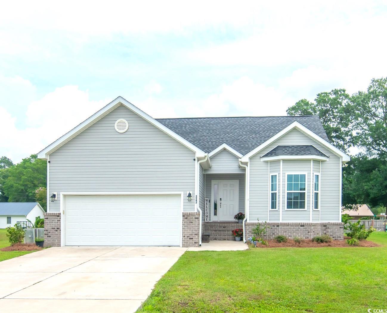 2242 Brier Street Georgetown, SC 29440 - Photo 1 of 29 View of front facade featuring a garage and a fron