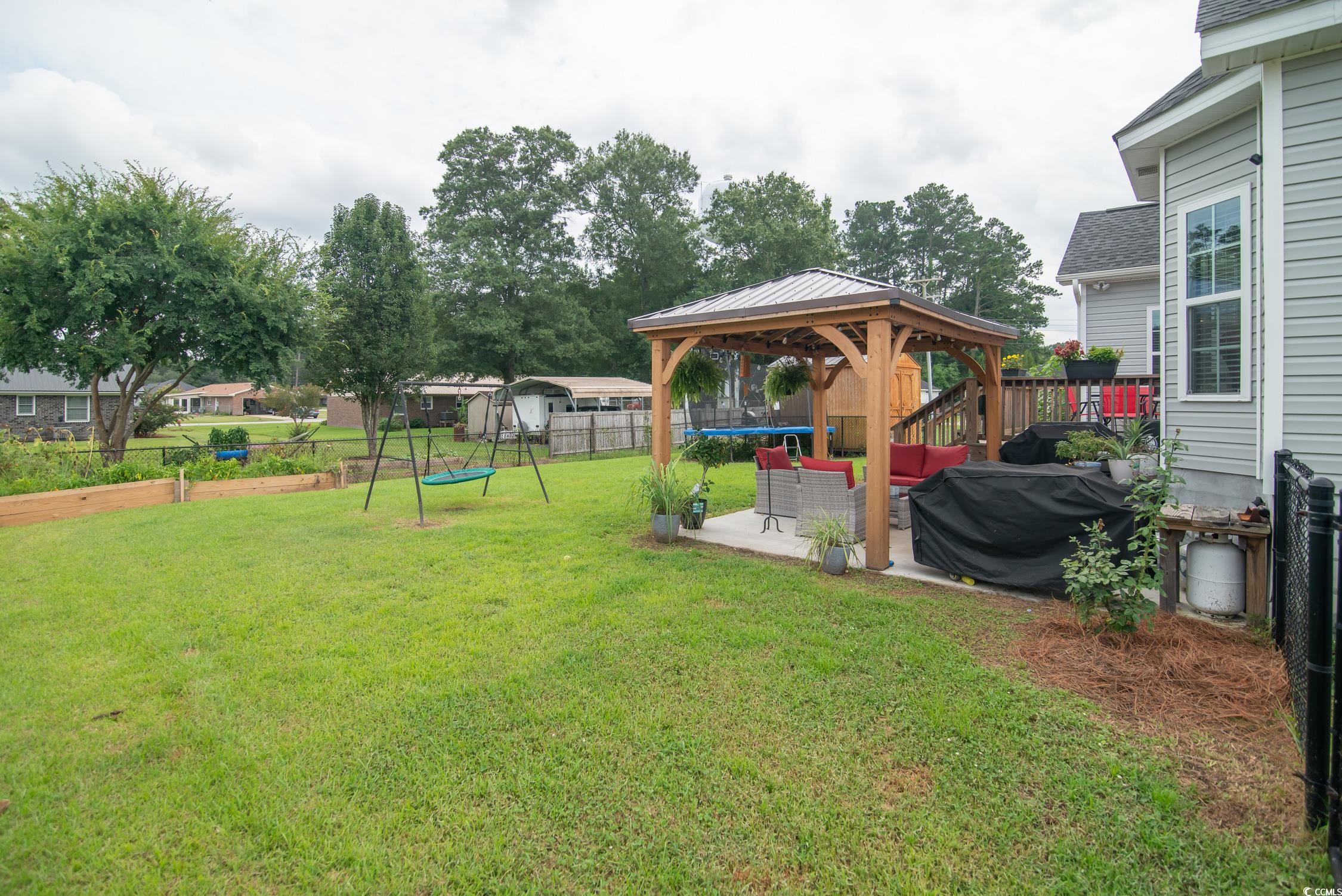 2242 Brier Street Georgetown, SC 29440 - Photo 21 of 29 View of yard featuring a patio area and a gazebo
